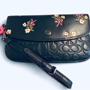 1941 Coach wristlet, hard to find floral.